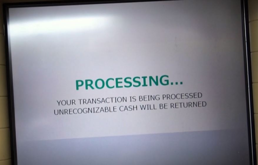 After inserting money, the processing screen will appear
